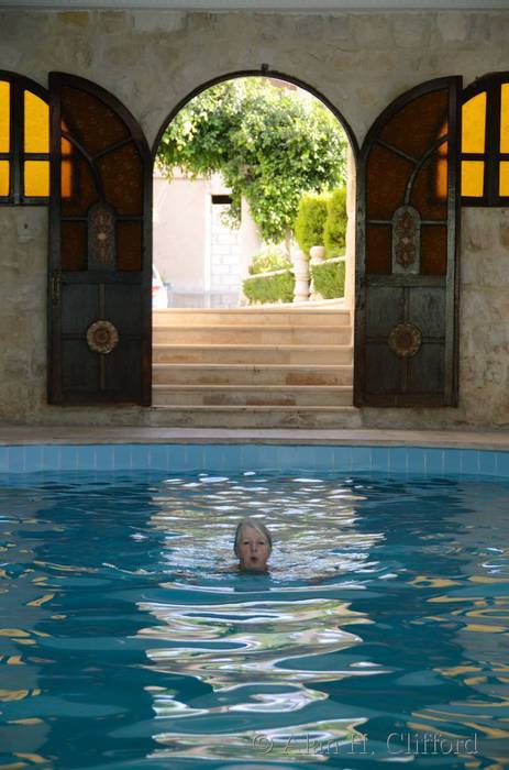 Margaret in the pool at the Amra Palace
